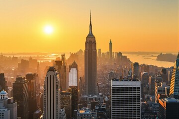 Stunning New York City skyline with Empire State Building at sunset.