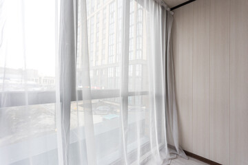Fototapeta premium the balcony of an apartment on the upper floors of an apartment building