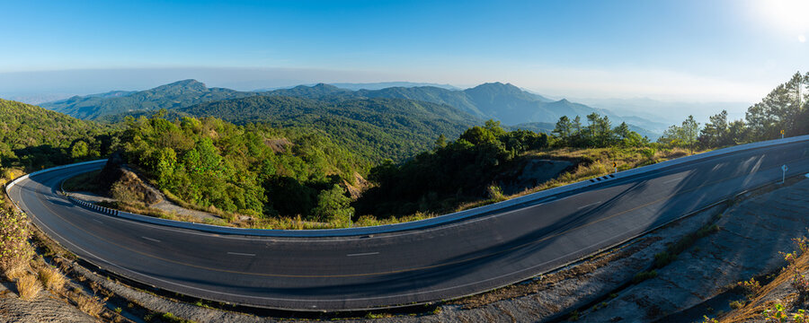 Panoramic view of a beautiful road winding through the scenic landscape of Doi Inthanon, Thailand