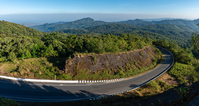 Panoramic view of a beautiful road winding through the scenic landscape of Doi Inthanon, Thailand