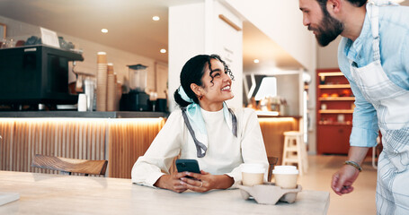 Coffee shop, happy and woman with waiter for service with drink, latte and beverage in cafeteria. Restaurant, hospitality and server with customer on smartphone for takeaway, thank you and order