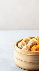 A bowl brimming with a variety of steamed dumplings placed on a table ready for enjoyment at a social gathering