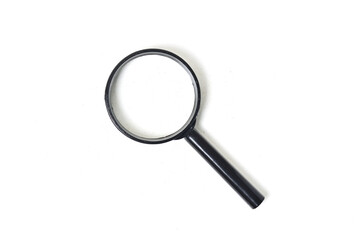 Top view of magnifying glass isolated on white background. Clipping path. Flat lay.