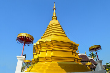 Fototapeta premium Pagoda and Chapel, Lanna Architecture, Symbols of Buddhism, South East Asia at San Pu Loei Saleewiangkaew Temple, Chiang Mai, Northern Thailand