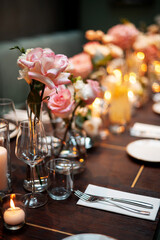 Elegant Dining Table with Floral Centerpieces