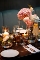 Elegant Dining Table with Floral Centerpieces