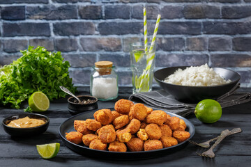 crunchy breaded salmon fish nuggets on plate