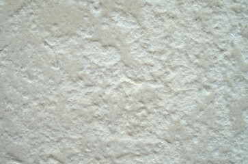 White relief surface closeup on wall