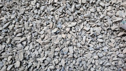 Gravel texture or gravel background for design. Real grunge texture background and small stone.Top view of ground gravel road. selective focus.	
