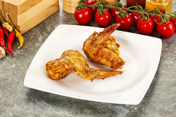 Tasty roasted chicken wing with spices