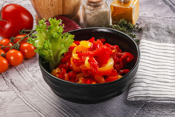 Diced raw bell red and yellow pepper