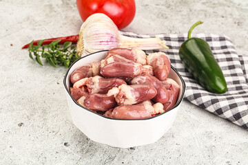 Fresh raw chicken hearts in the bowl