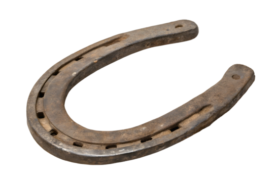 A weathered horseshoe, a symbol of good luck and enduring strength, rests against a stark white backdrop, showcasing its rustic charm and worn metal. On white Or png Background