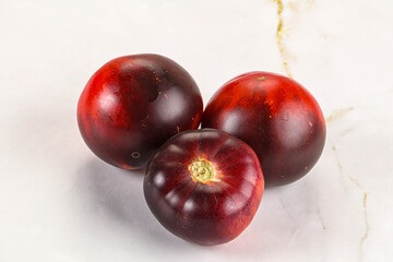 Black ripe juicy organic tomato