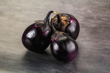 Raw violet and black eggplant