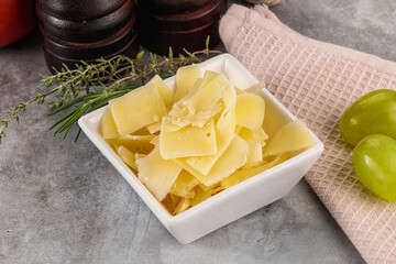 Parmesan cheese slices in the bowl