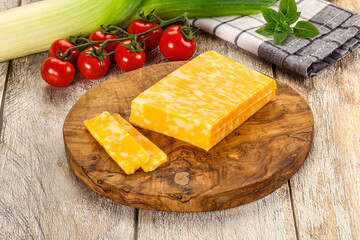 Marble yellow cheese with slices