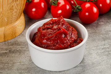 Red tomato paste in the bowl