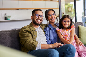 Portrait of smiling multiethnic family wearing eyeglasses © Rido