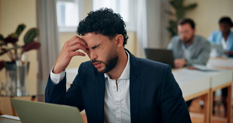 Office, businessman and headache with laptop for stress, brain fog and fatigue for auditing...