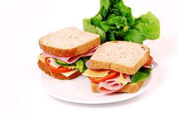 Healthy ham sandwich with cheese, tomatoes on white background
