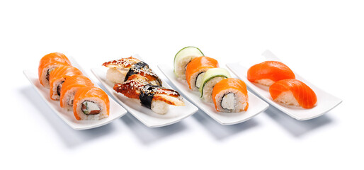 Assorted sushi and maki rolls beautifully arranged on plates