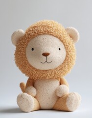 Obraz premium Stuffed lion toy sits alone, isolated against blank background, for children or baby product design