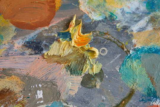 Colorful paint background with coarse texture in layers