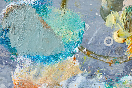 Colorful paint background with coarse texture in layers