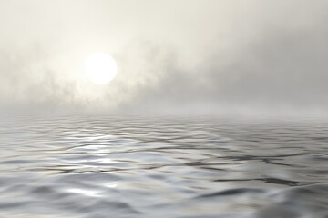 Serene foggy seascape with a hazy sun, evoking calmness and tranquility.