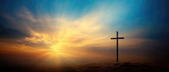 Cross of Calvary illuminated by dramatic lighting at dawn