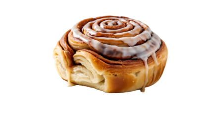 A close up shot of a cinnamon roll with white icing