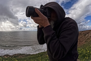 Obraz premium Photographer with a camera