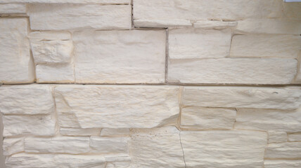 background beige brown tilling brick wall in modern building house facade