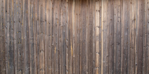 Naklejka premium Wall line vertical fence wooden surface texture for facade decoration wood brown natural background