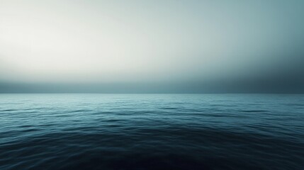 Obraz premium A flowing gradient of inky darkness and aquamarine blending seamlessly, mirroring the meditative beauty of the open sea