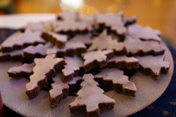 Plate of Christmas Tree Shaped Iced Gingerbread Cookies