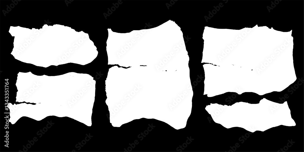 Aufkleber torn papers scattered across a dark surface evoke feelings of nostalgia and lost thoughts in a creat