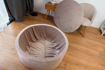Modern Beige Velvet Round Folding Chair with Removable Cushion in Stylish Minimalist Interior