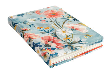 A beautifully designed floral journal resting on a soft surface, inviting creativity with its vibrant colors and intricate details