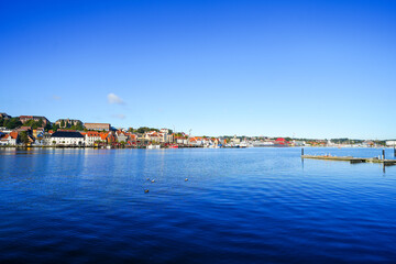 View of the historic harbor of the city of Flensburg and the surrounding landscape. Flensburg harbor on the fjord.
