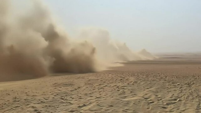 Vast desert strong sandstorm is across expansive dunes. Sand and dust storms (SDS).
Extreme weather concept and global climate change
