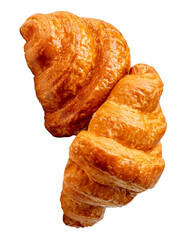 Side view of two brown or golden loaves of croissants in stack or heap isolated with clipping path in png file format