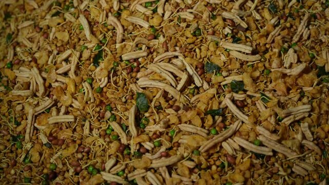 Making of Bengali spicy food chanachur.