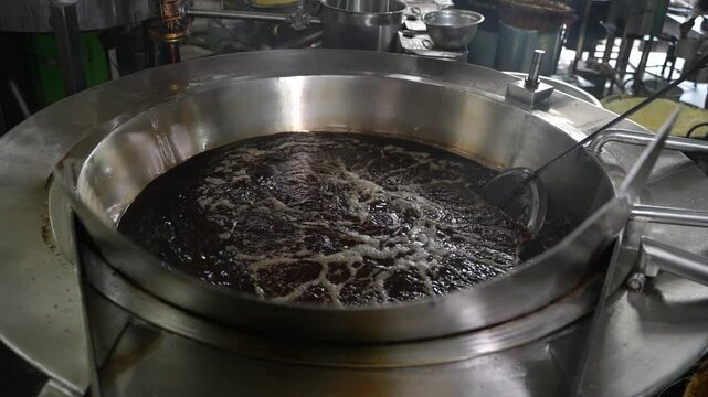 Making of Bengali spicy food chanachur.