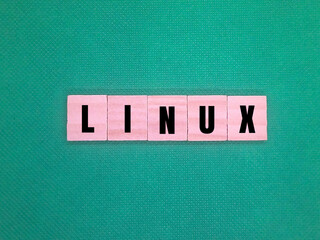 LINUX word alphabet blue background.  internet concept Linux is a family of open-source Unix-like...