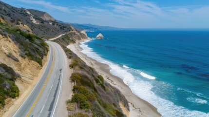 An aerial view of a coastal road by the ocean
