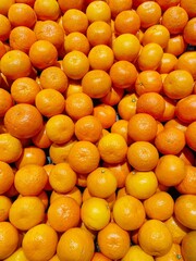 Orange fruit in grocery store. Oranges background or Oranges texture at the super market