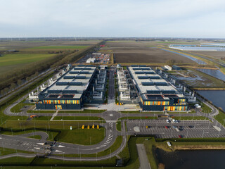 Aerial drone views of a supercomputer data center, artificial intelligence, and internet...