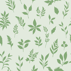 A seamless vector pattern with various green leaves in silhouette art style, creating a fresh and natural botanical design